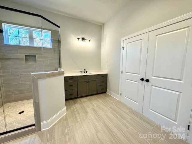 3850 Willow Grove Ln Unit 24, Concord, NC 28025 - full bathroom with a tile shower, vanity, and baseboards