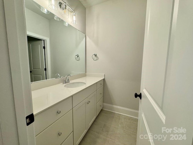3850 Willow Grove Ln Unit 24, Concord, NC 28025 - bathroom with baseboards, vanity, and tile patterned floors