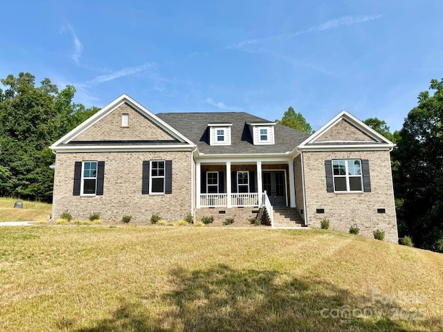 3850 Willow Grove Ln Unit 24, Concord, NC 28025 - view of front of property with a porch, brick siding, a front lawn, crawl space, and roof with shingles
