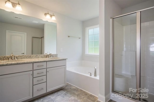 bathroom with vanity and plus walk in shower