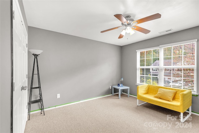 unfurnished room featuring carpet flooring and ceiling fan