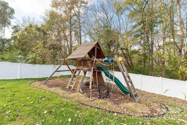 view of play area featuring a lawn