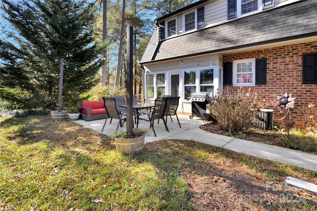 view of patio featuring grilling area and an outdoor hangout area