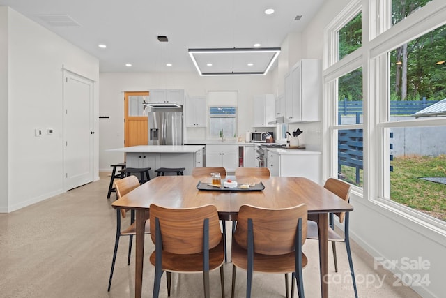 dining space with sink