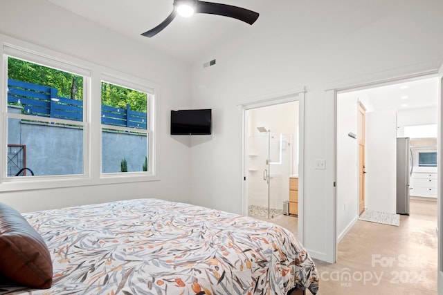 bedroom with ensuite bath and ceiling fan