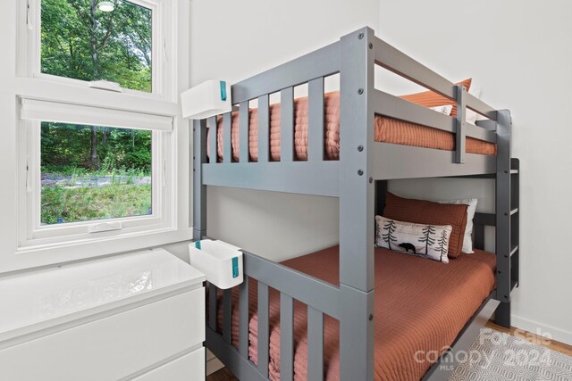 bedroom featuring hardwood / wood-style flooring