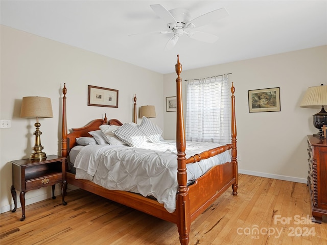 bedroom featuring light hardwood / wood-style floors and ceiling fan