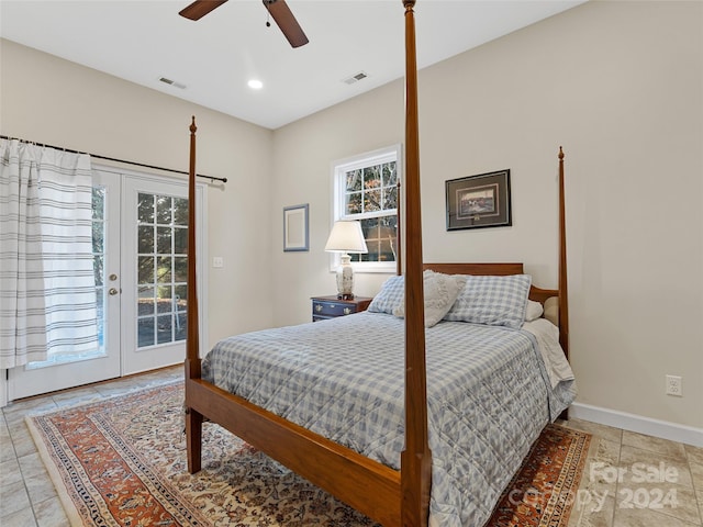 bedroom with ceiling fan, access to exterior, light tile patterned floors, and french doors