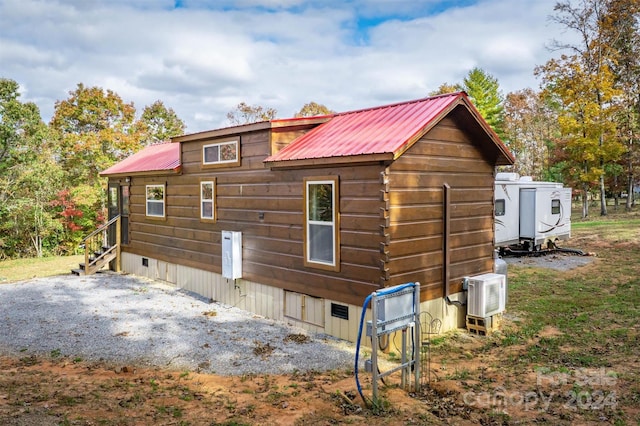 view of property exterior featuring ac unit