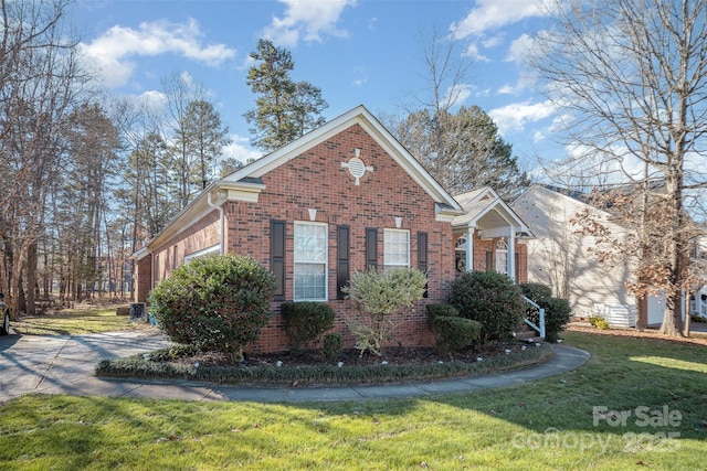 view of property exterior featuring a lawn