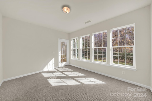 view of carpeted spare room