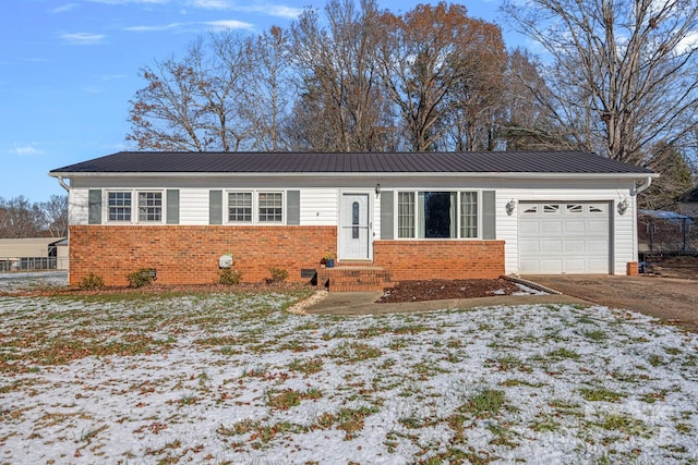 view of front of home with a garage