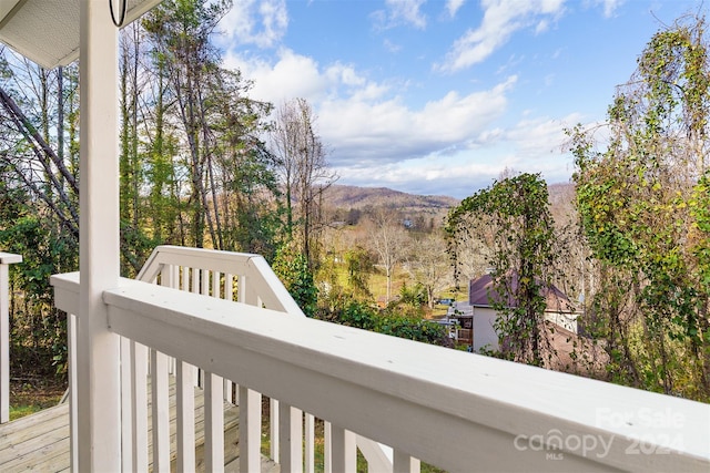 balcony featuring a mountain view