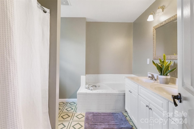 bathroom featuring vanity and separate shower and tub