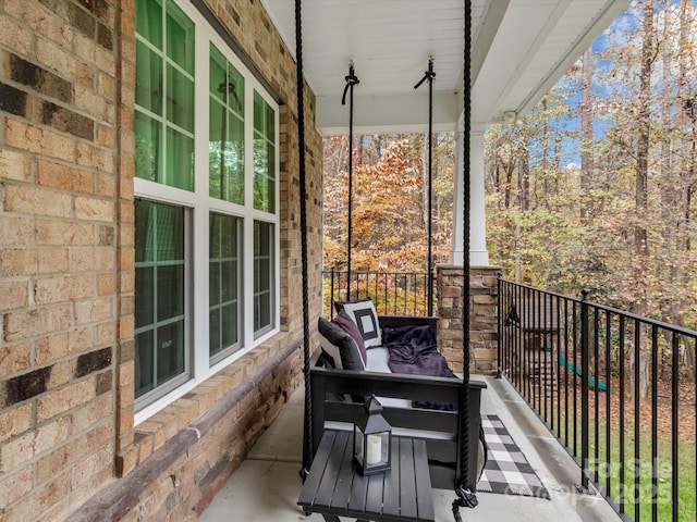 balcony featuring covered porch