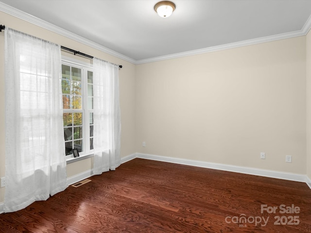 unfurnished room featuring dark hardwood / wood-style flooring and crown molding