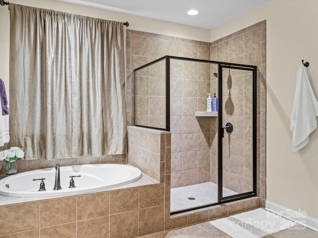 bathroom with plus walk in shower and tile patterned floors