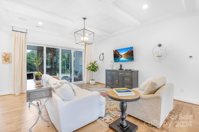 living room featuring light wood-type flooring, coffered ceiling, crown molding, beam ceiling, and a notable chandelier