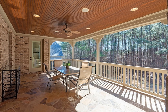 view of patio / terrace featuring outdoor dining space and ceiling fan