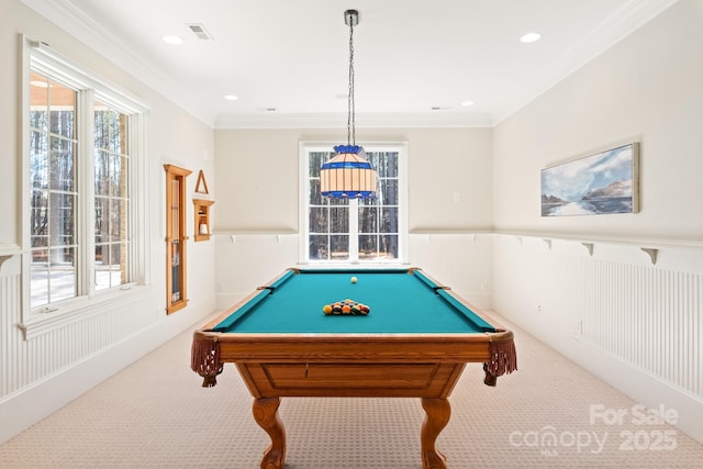 game room featuring a wainscoted wall, carpet floors, visible vents, and crown molding