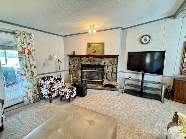 carpeted living room with crown molding, a fireplace, and a textured ceiling