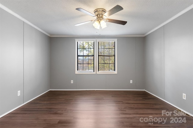 spare room with ceiling fan, dark hardwood / wood-style flooring, and a textured ceiling