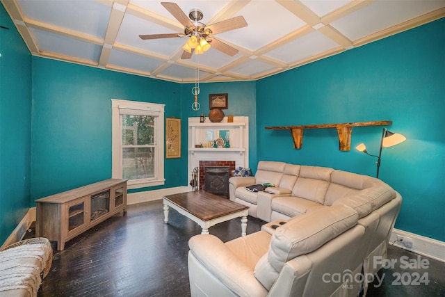 living room with ceiling fan, beam ceiling, dark wood-type flooring, and coffered ceiling