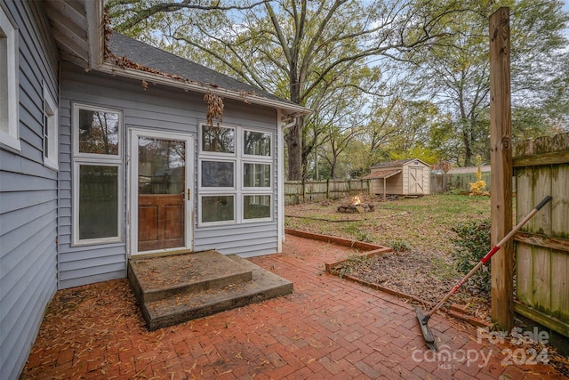 exterior space featuring a shed