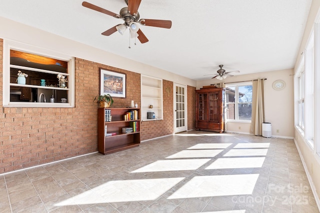 interior space featuring ceiling fan