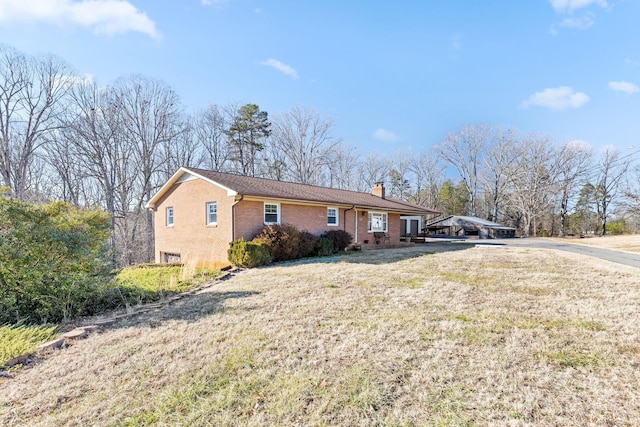 view of front of home with a front lawn