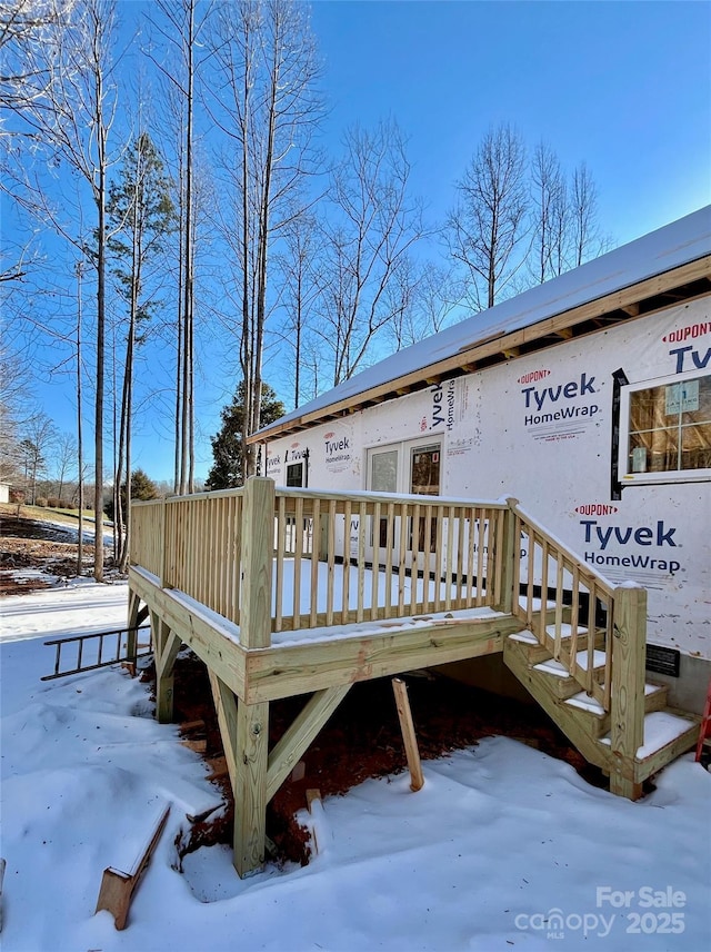 view of snow covered deck