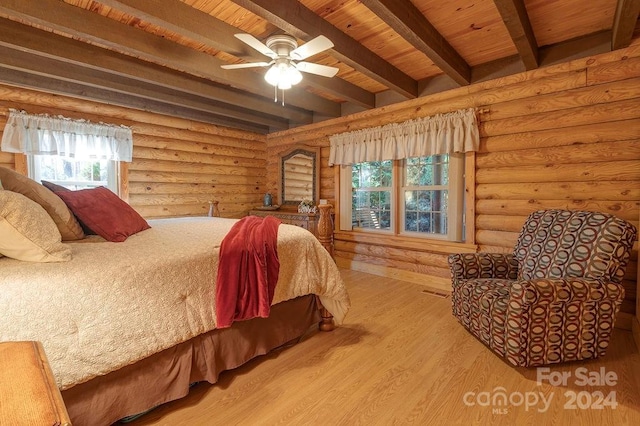 bedroom featuring rustic walls, ceiling fan, wooden ceiling, beamed ceiling, and wood-type flooring