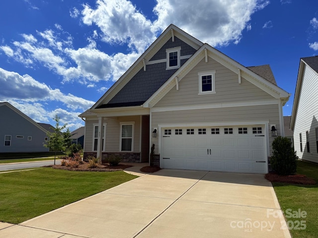 405 Northgate Blvd, Indian Trail, NC 28079 - craftsman inspired home with a front lawn, driveway, and stone siding