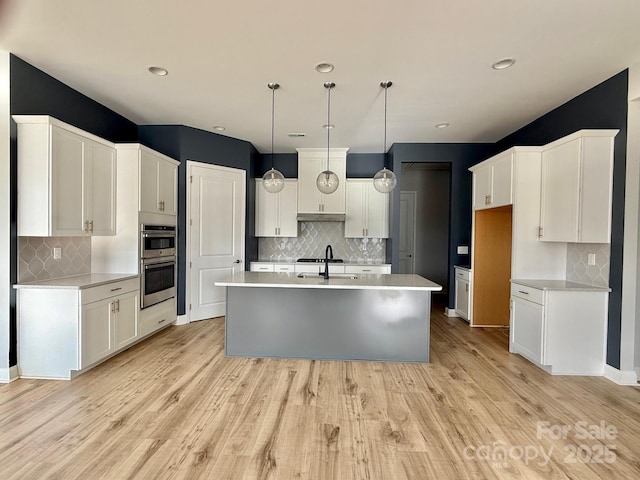 405 Northgate Blvd, Indian Trail, NC 28079 - kitchen with tasteful backsplash, double oven, a sink, and recessed lighting