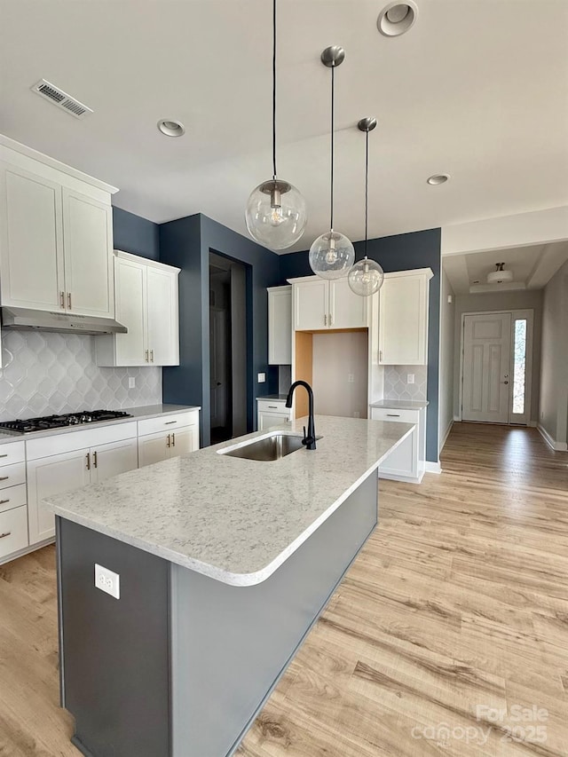 405 Northgate Blvd, Indian Trail, NC 28079 - kitchen featuring a sink, gas stovetop, a large island with sink, light wood-type flooring, and recessed lighting