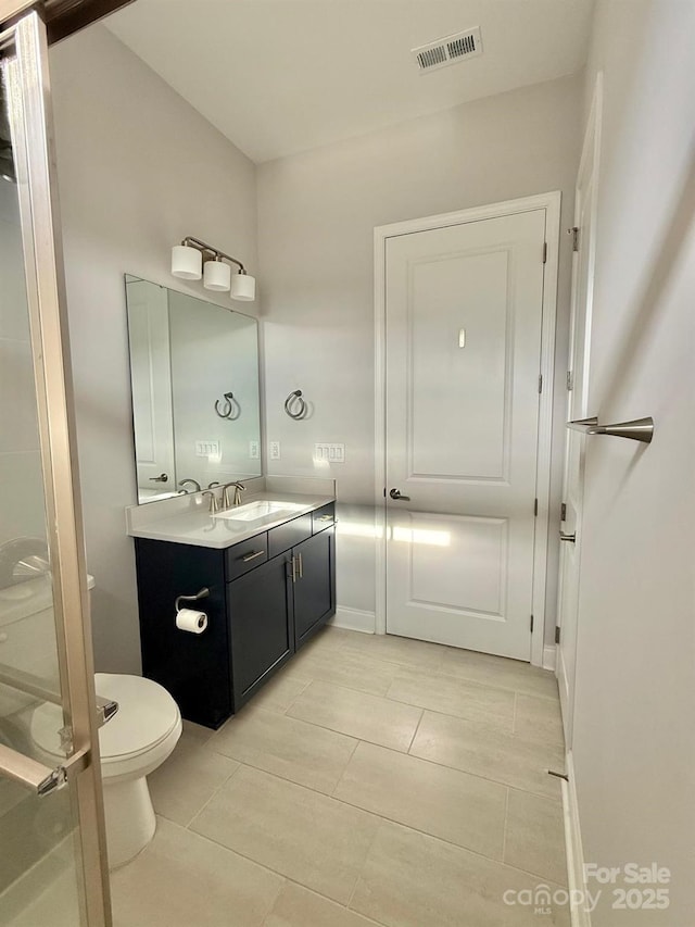 405 Northgate Blvd, Indian Trail, NC 28079 - bathroom with vanity, toilet, and tile patterned flooring