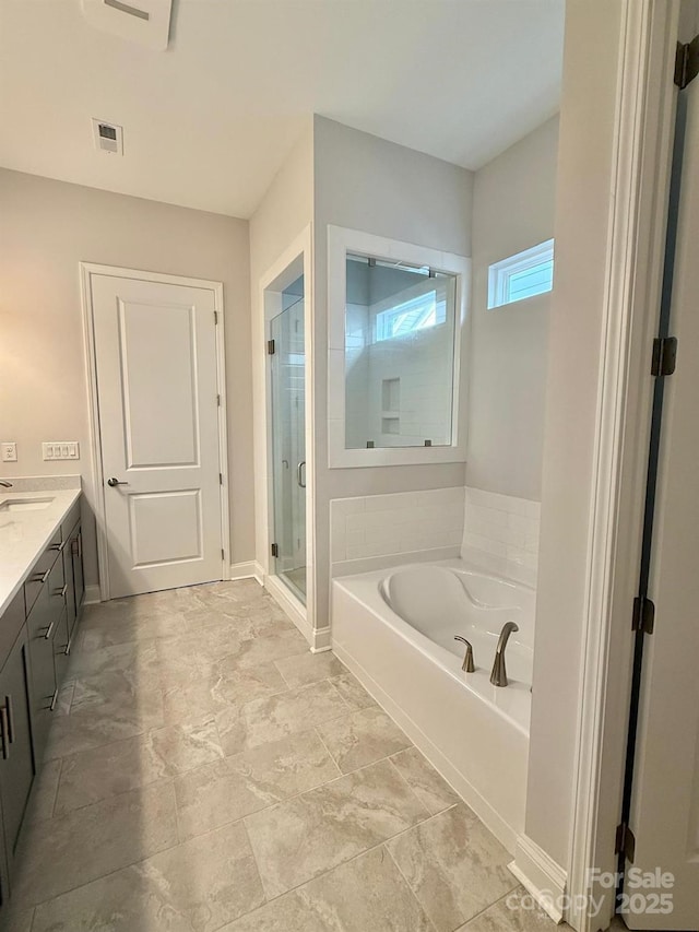 405 Northgate Blvd, Indian Trail, NC 28079 - full bath featuring a bath, a shower stall, and vanity