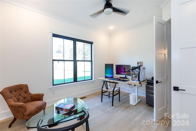 office with ceiling fan, ornamental molding, and light wood-type flooring