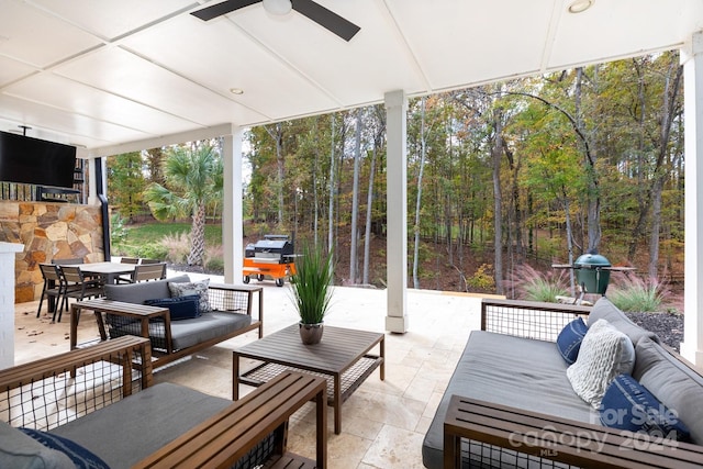 view of patio / terrace with ceiling fan and an outdoor hangout area