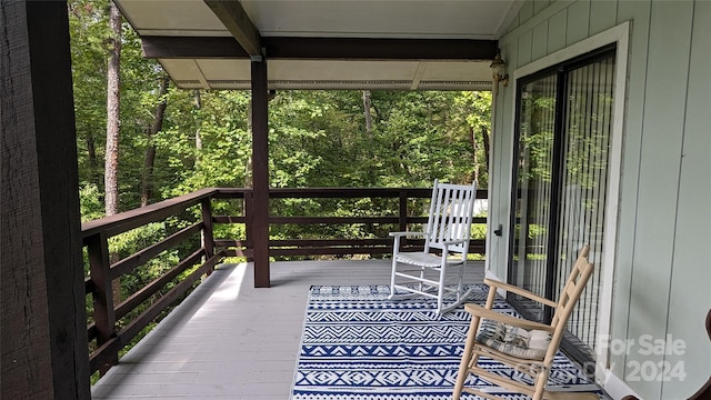 wooden balcony with a deck