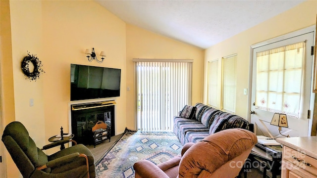 living room with lofted ceiling