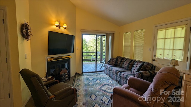 living room with vaulted ceiling