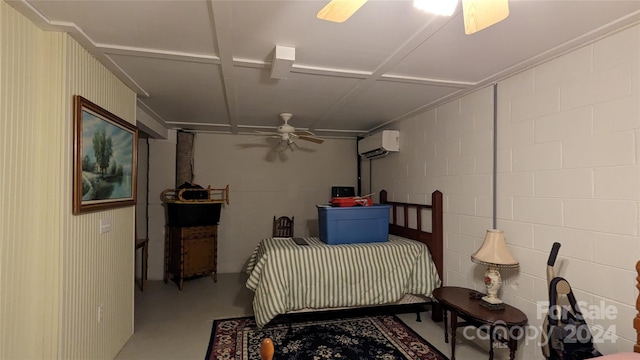 bedroom with ceiling fan, concrete floors, and a wall mounted air conditioner