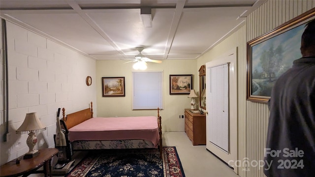 bedroom featuring ceiling fan and coffered ceiling