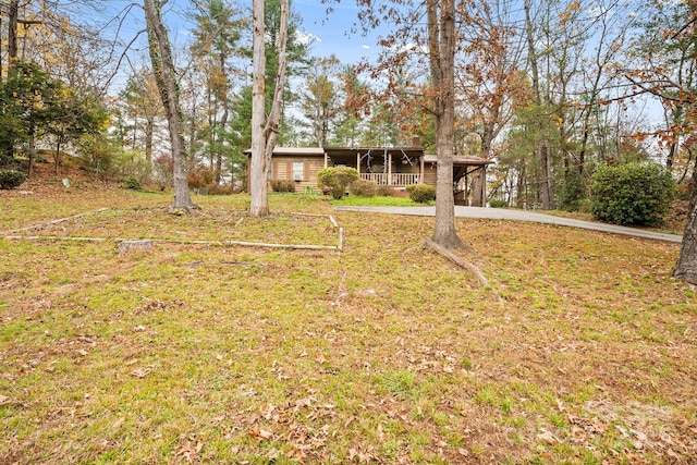 view of yard featuring a carport