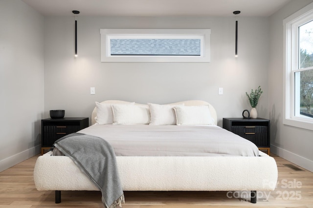 bedroom featuring hardwood / wood-style floors