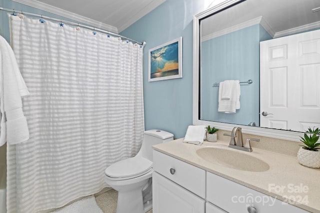 bathroom featuring vanity, toilet, and crown molding