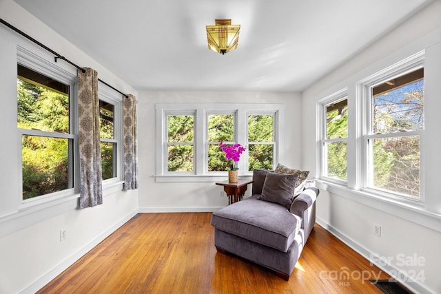 sunroom / solarium featuring plenty of natural light