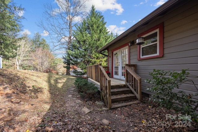 view of yard featuring french doors