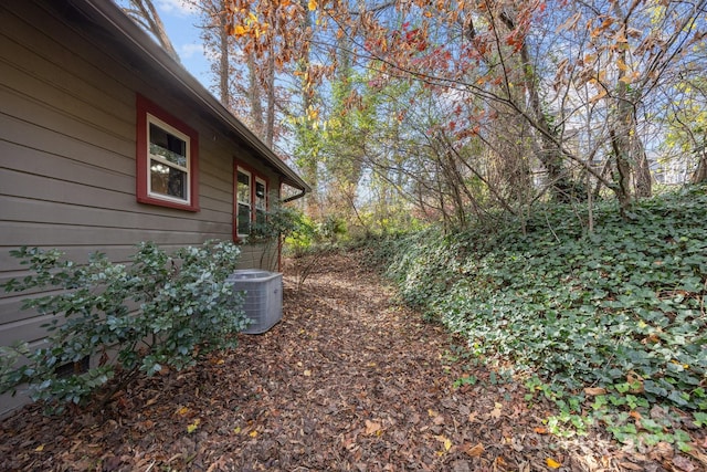 view of yard featuring central AC unit